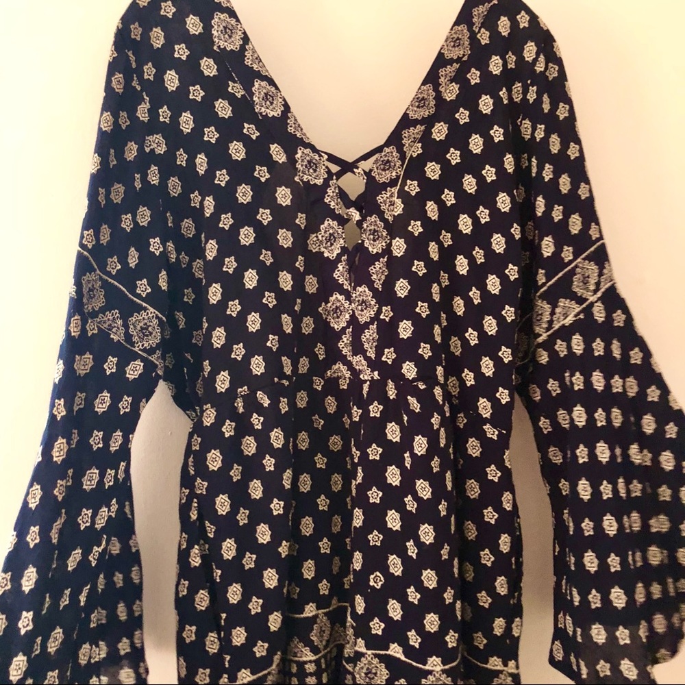 Long-sleeved navy romper